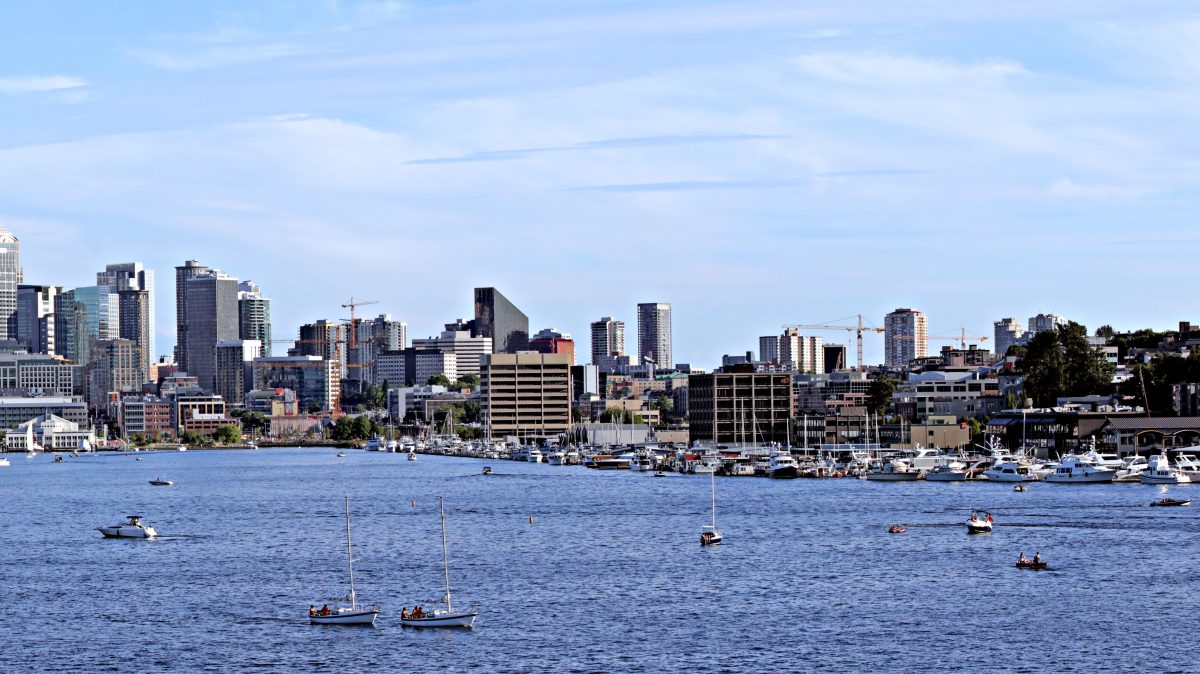 Seattle skyline with the Space Needle and boats on the water.