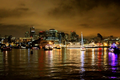a boat is docked next to a body of water
