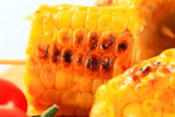 a group of oranges on a table