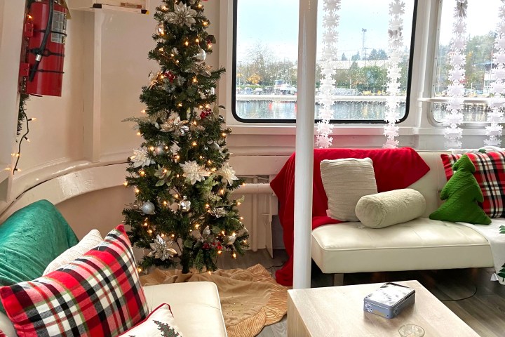 a living room filled with furniture and a large window