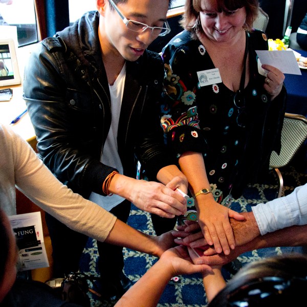 a group of people sitting at a table