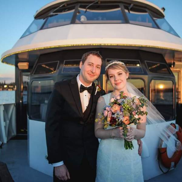 a person standing in front of a boat