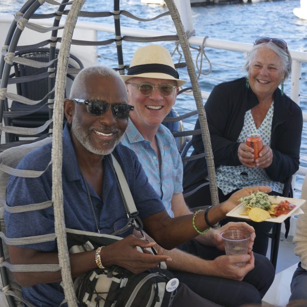 a couple of people that are sitting on a boat