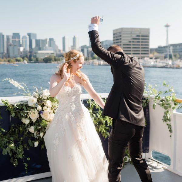 a person holding a fish in the water