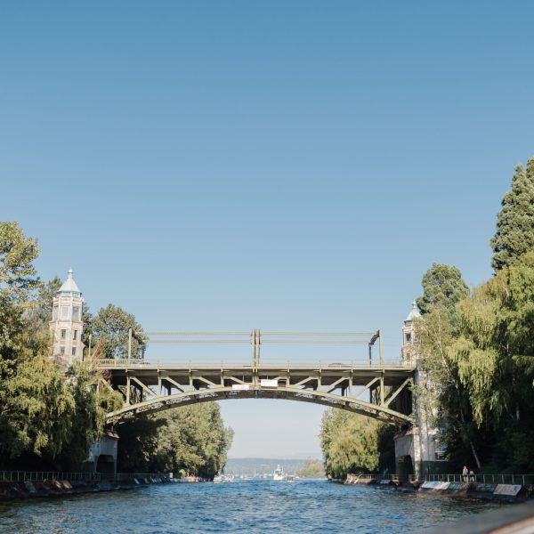 a train crossing a bridge over a river