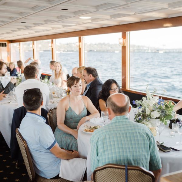 a group of people sitting at a table