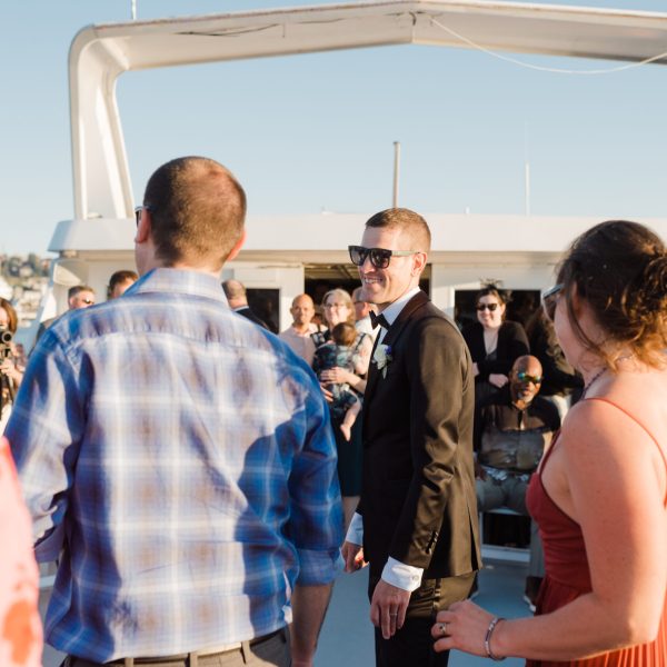 a group of people standing in front of a crowd