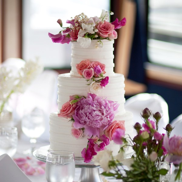 a bouquet of flowers in a vase on a table