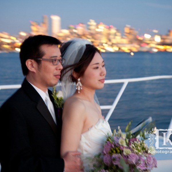 Siu-Wong Fan standing in front of a body of water