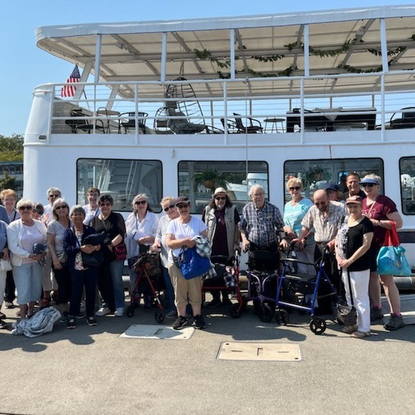 a group of people standing in front of a building