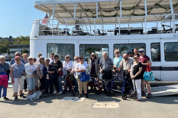 a group of people standing in front of a building