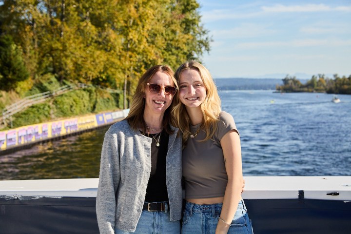 a person standing in front of a body of water